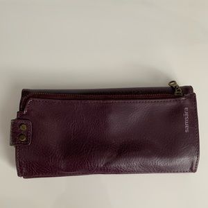 Plum Purple wallet with several pockets from SamSara made by Matt and nat